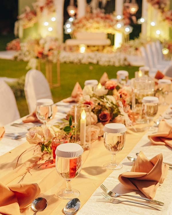 night-dinner-long-table-with-white-table-cloth-and-2025-05-13-10-16-48-VXNJ5PJ.jpg
